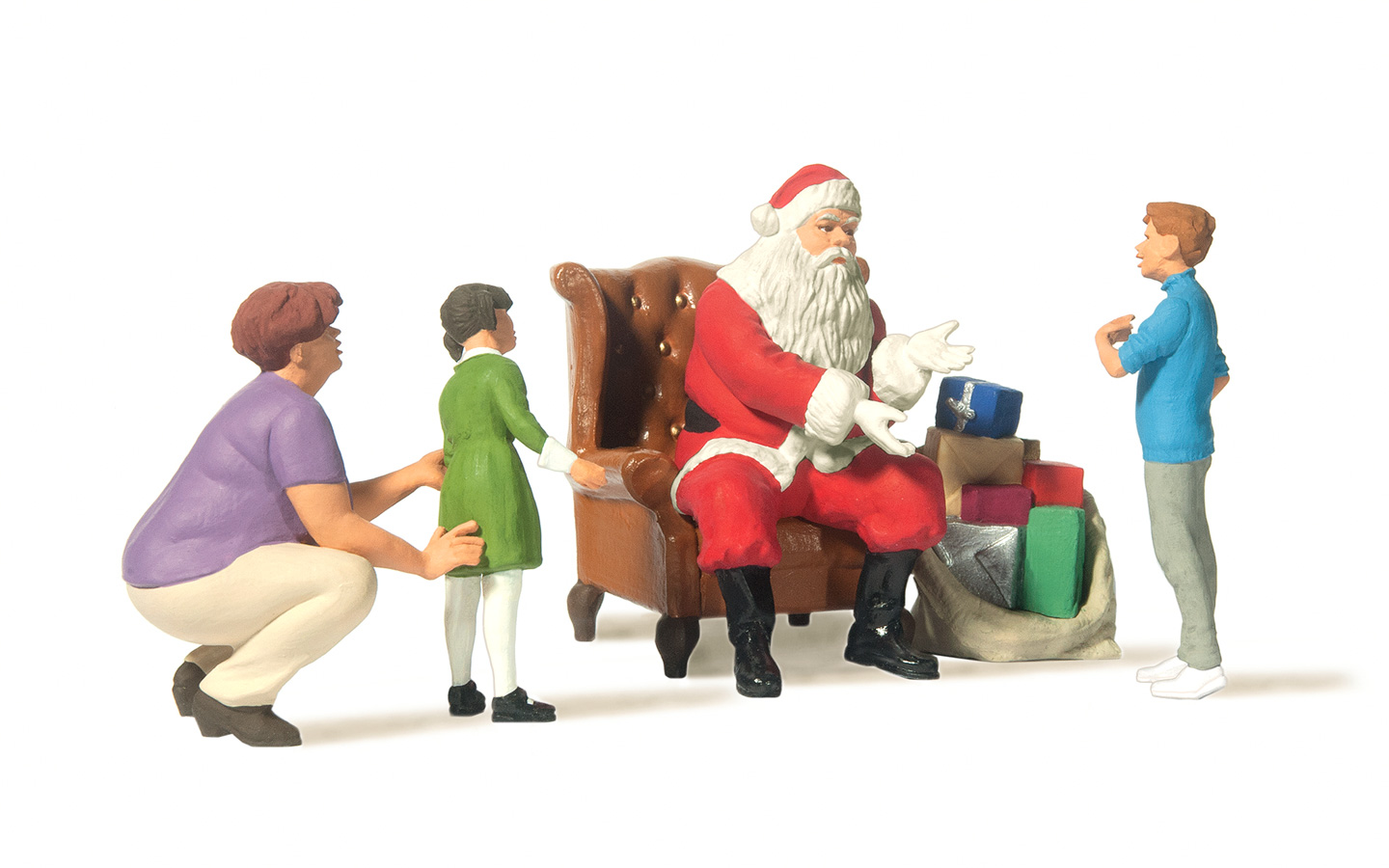 Weihnachtsmann in Sessel.Mutt